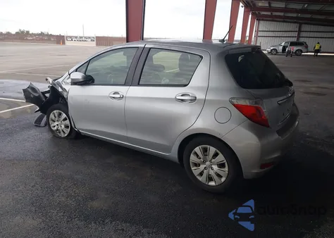 2013 Toyota Yaris Le z USA, uszkodzony, nr VIN JTDKTUD32DD559401
